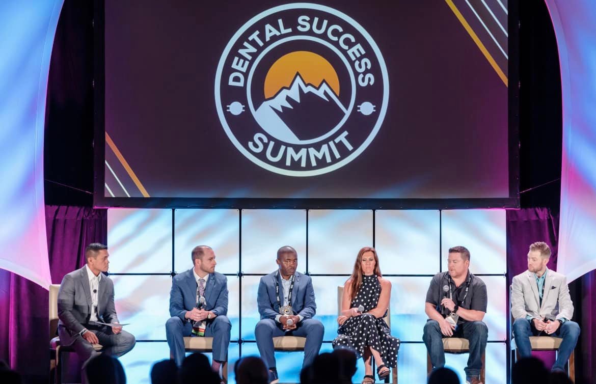Me on stage with fellow panelists at the Dental Success Summit